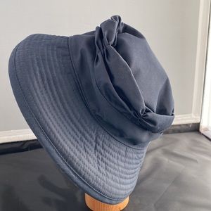 COPY - Ladies Navy blue Burberry rain hat. Size M with red and blue plaid liner.